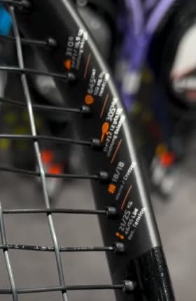 The PP01 Tour's printed specs: 310 g and a 305 mm balance.